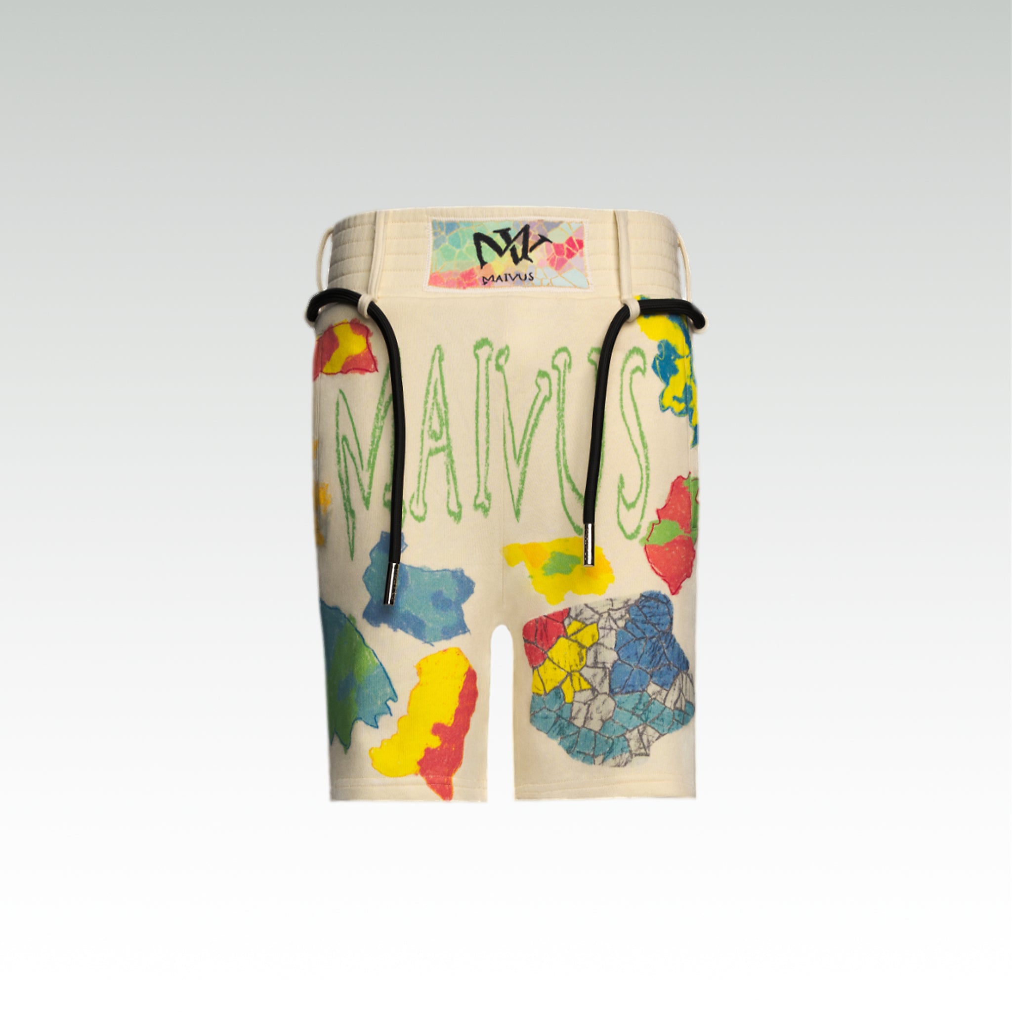 Close up of the luxury multicolored shorts with abstract shapes and 'MAIVUS' branding 'MAIVUS' against a white studio backdrop