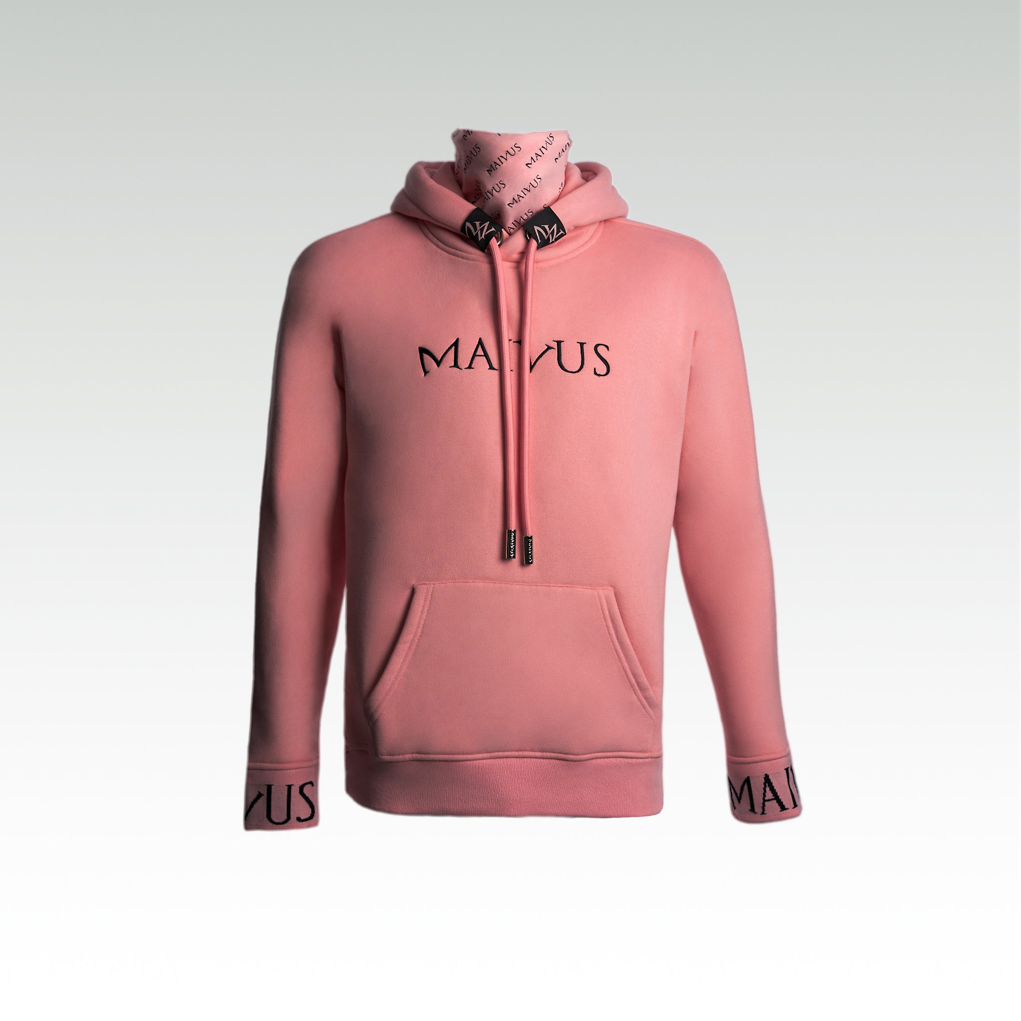 Close up of  a luxury pink and black hoodie with black embroidery, branded snood, large drawstrings, and branded cuffs from 'MAIVUS' against a white studio 